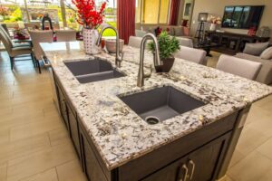 A stylish kitchen featuring polished granite countertops and a contemporary sink for beauty and utility